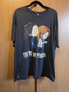 Greys Anatomy-Bella Canvas Dark Gray Graphic Tee with Cartoon Duo and Red Accent